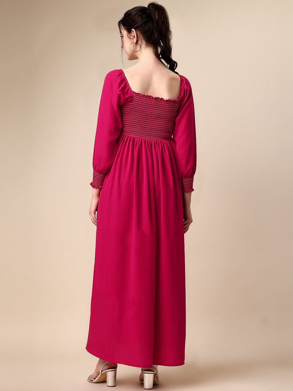 Woman in a long magenta dress with puff sleeves and square neckline, back view